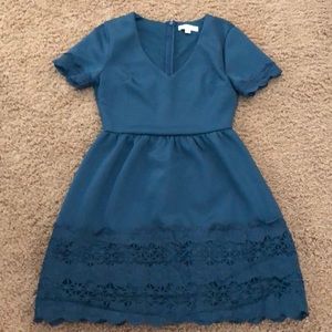 Francesca’s emerald green dress